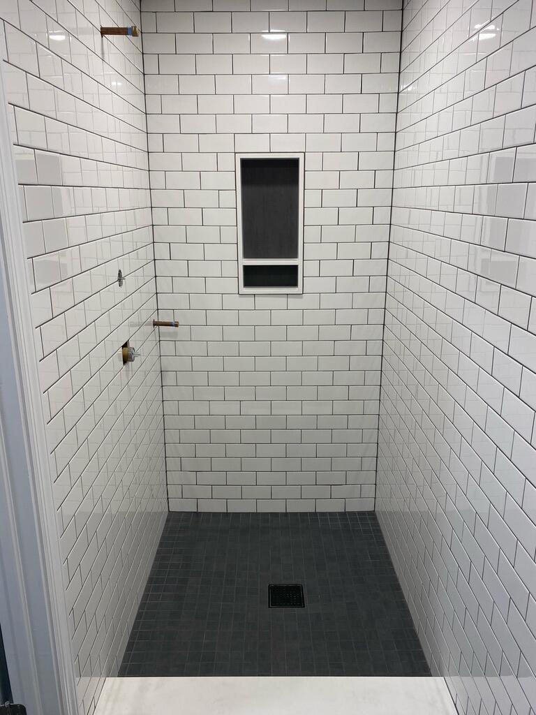 Residential Bathroom — Walk-In Subway Tile Shower — completed by FirstLine Build Group in LaGrange, NY